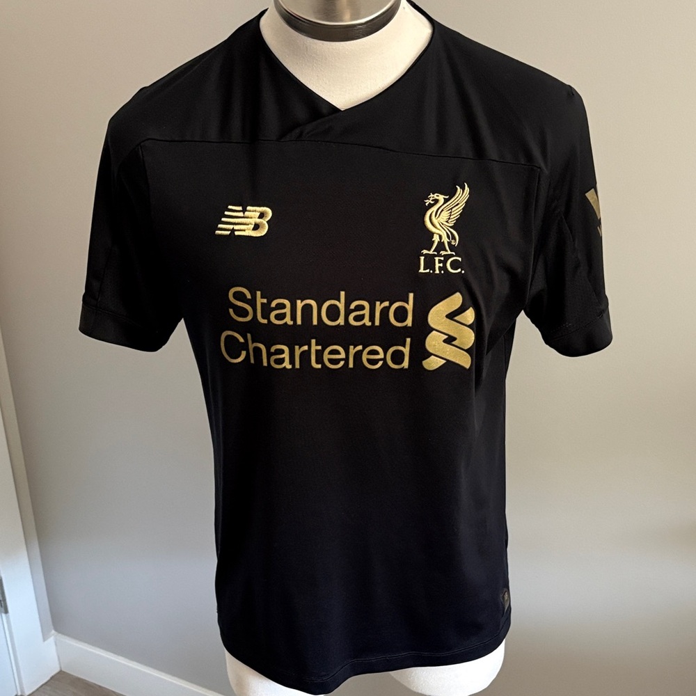 New Balance Men's Black and Gold Jersey